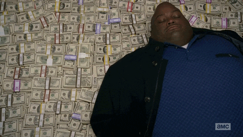 Man lying on a bed of money, SEO content management