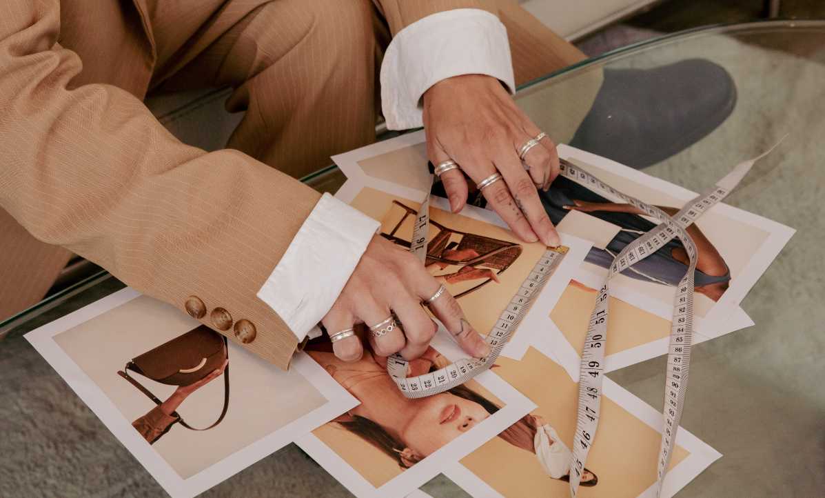 business woman sorting through fashion images